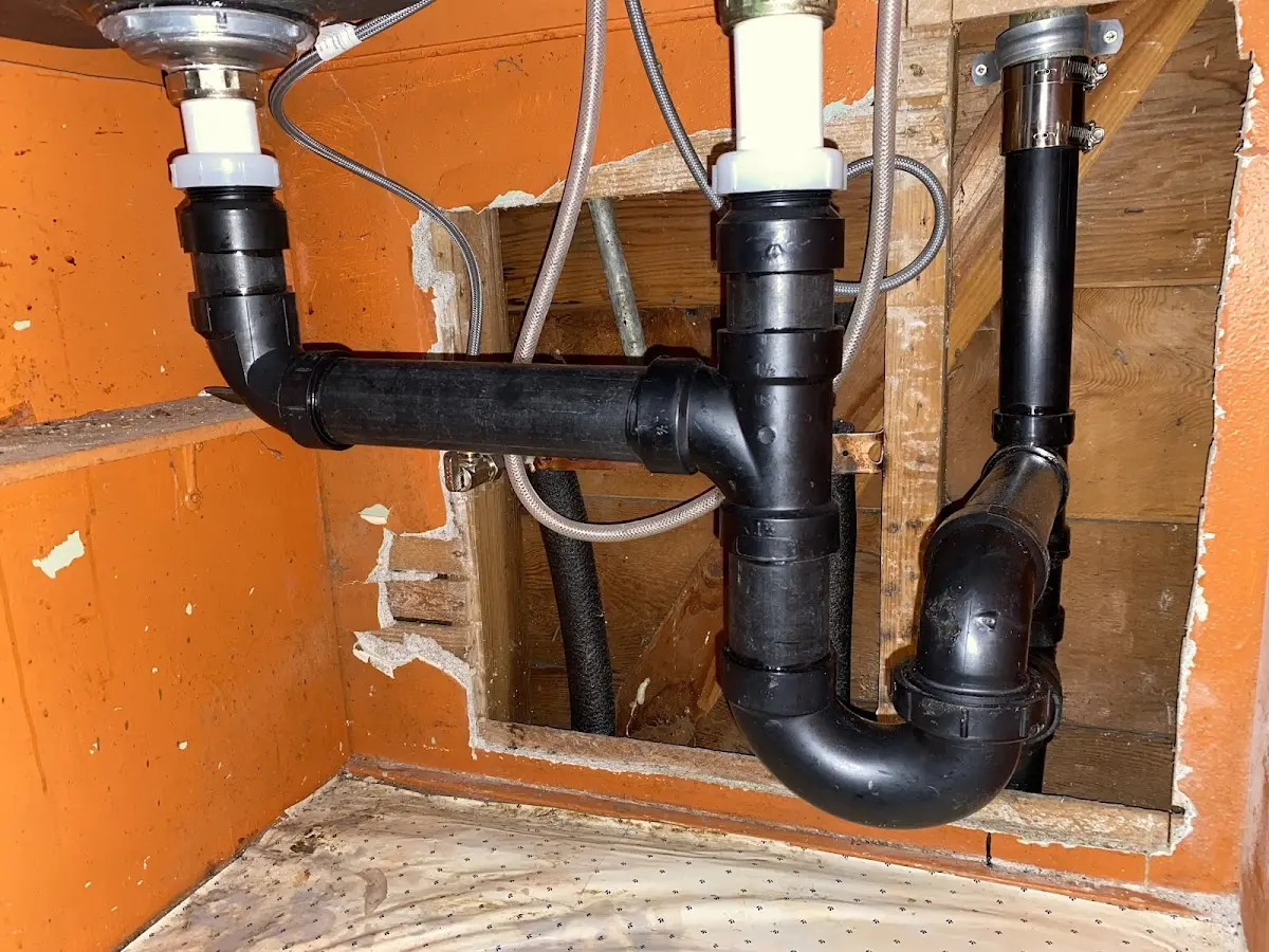 Professional Garbage Disposal Repair equipment and tools on the job in Gary